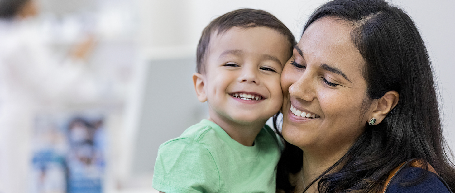Parent and child smiling
